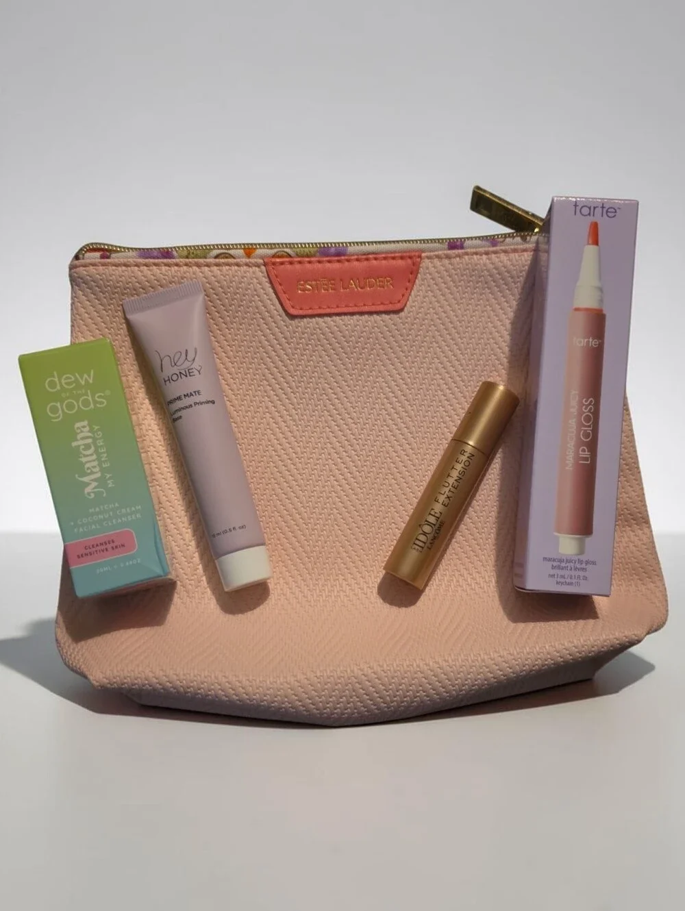 Estee Lauder Pink Textured Makeup Pouch with Assorted Lip & Skincare